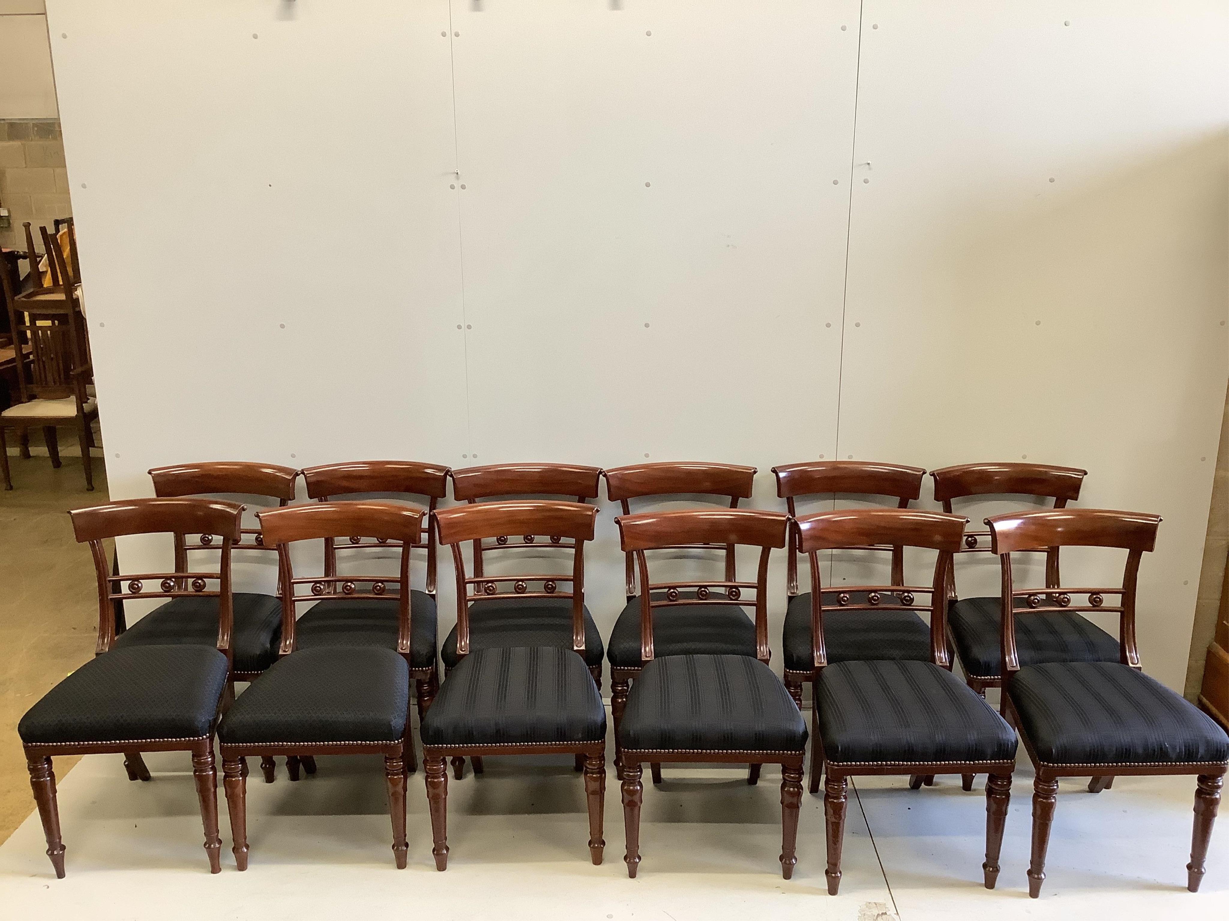 A set of twelve Regency style mahogany dining chairs, width 48cm, depth 45cm, height 88cm. Condition - fair to good